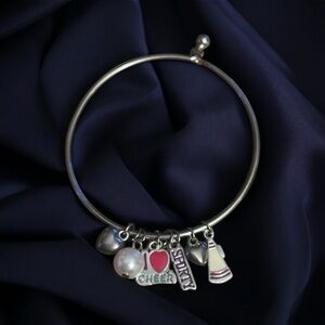 Silver tone cheer charm bangle bracelet